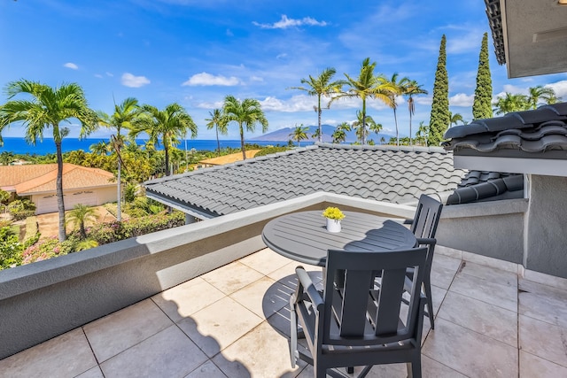 view of patio featuring a water view