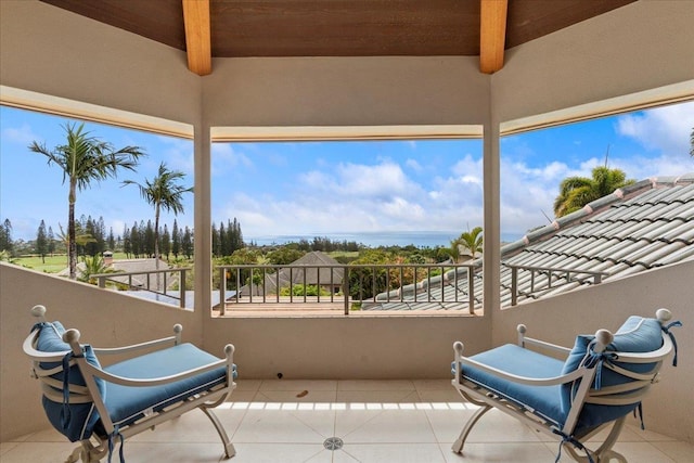 view of patio featuring a balcony