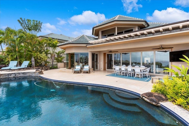 back of house featuring ceiling fan and a patio