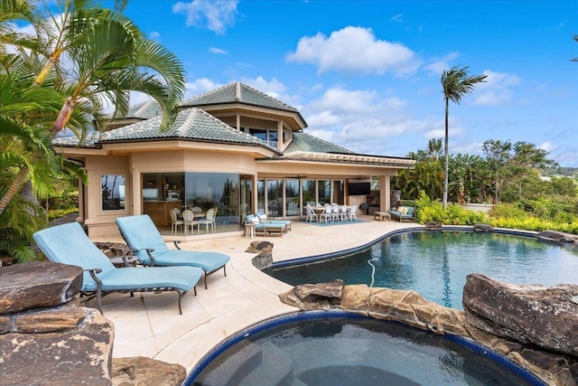 view of swimming pool featuring a patio