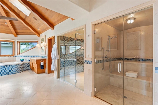 bathroom featuring wooden ceiling, vaulted ceiling with skylight, separate shower and tub, and tile patterned flooring