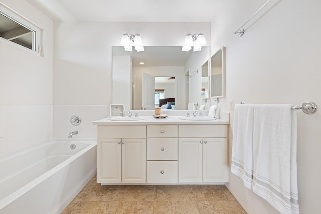 124 Kapela Pl, Kahului, HI 96732 - bathroom with a sink, double vanity, a garden tub, and tile patterned flooring