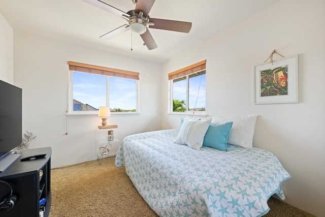 124 Kapela Pl, Kahului, HI 96732 - bedroom featuring light carpet and ceiling fan