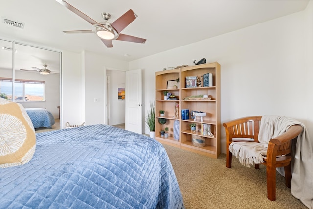 124 Kapela Pl, Kahului, HI 96732 - bedroom with carpet, a closet, a ceiling fan, and visible vents