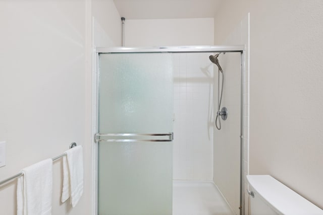 124 Kapela Pl, Kahului, HI 96732 - bathroom featuring toilet and a shower stall