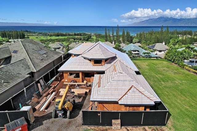 birds eye view of property featuring a water and mountain view