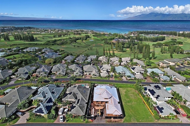 birds eye view of property featuring a water and mountain view