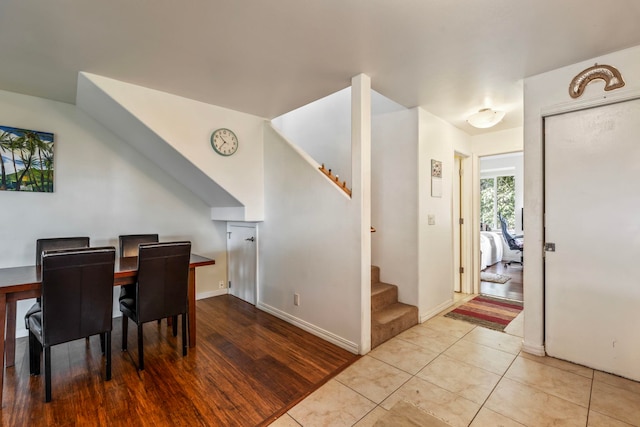 dining room with light hardwood / wood-style flooring