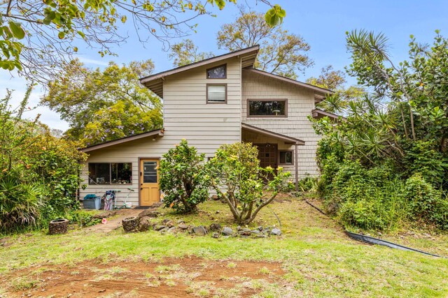 view of front of house with a front yard