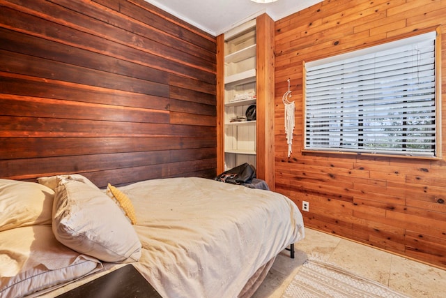 tiled bedroom featuring wooden walls