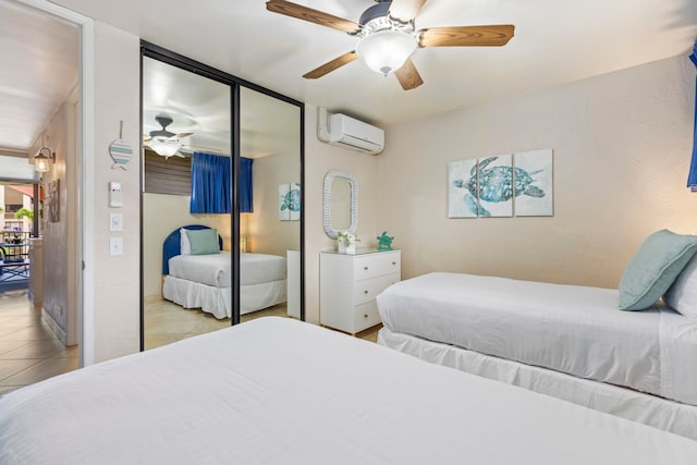 bedroom with ceiling fan, light tile patterned flooring, and a wall unit AC