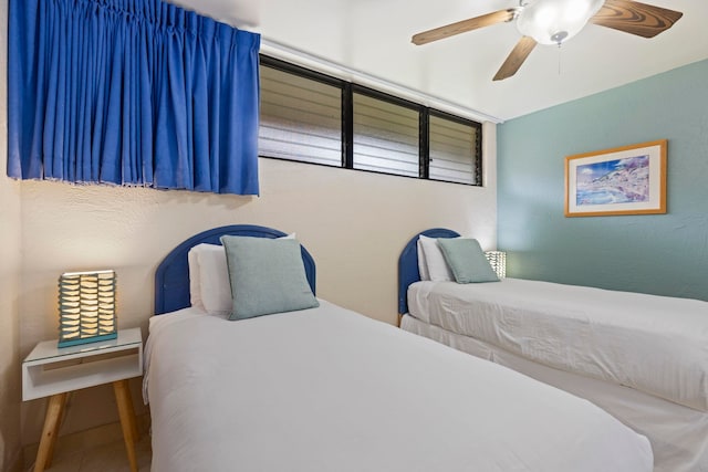 bedroom featuring ceiling fan