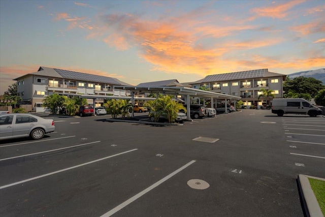 parking at dusk with covered and uncovered parking