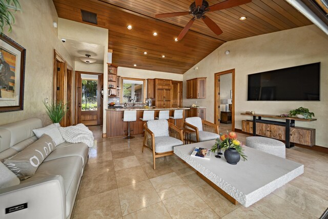 living room featuring a ceiling fan, recessed lighting, wooden ceiling, baseboards, and vaulted ceiling