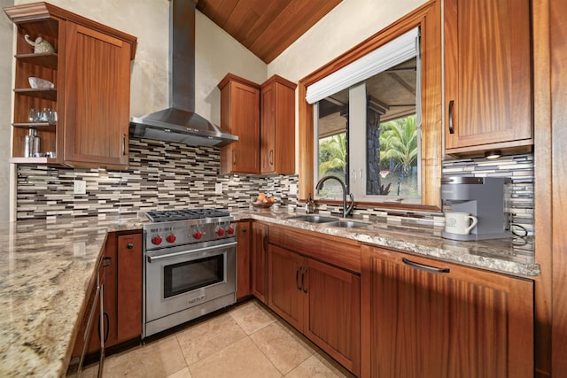 kitchen with a sink, open shelves, designer stove, wall chimney exhaust hood, and backsplash