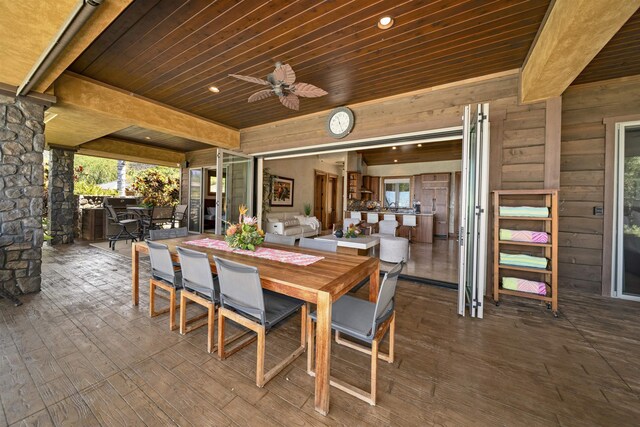 view of patio / terrace with ceiling fan and outdoor dining space
