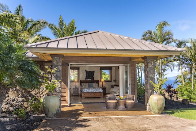 view of outbuilding featuring outdoor lounge area