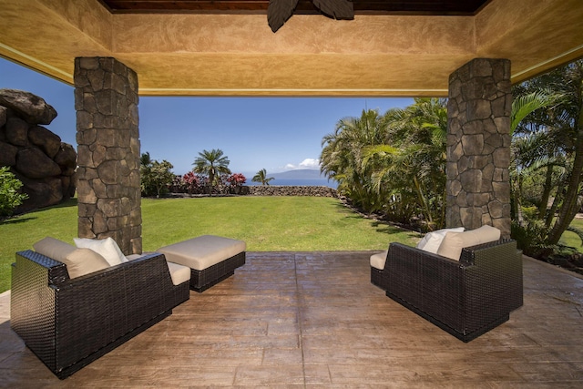 view of patio with ceiling fan and outdoor lounge area