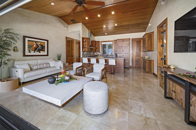 living room featuring visible vents, recessed lighting, vaulted ceiling, ceiling fan, and wood ceiling