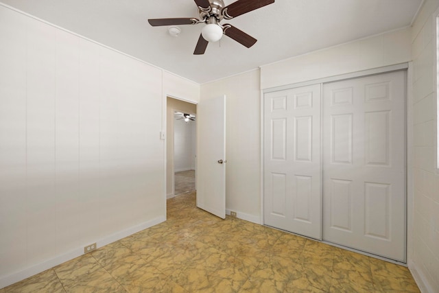 unfurnished bedroom featuring a closet and ceiling fan