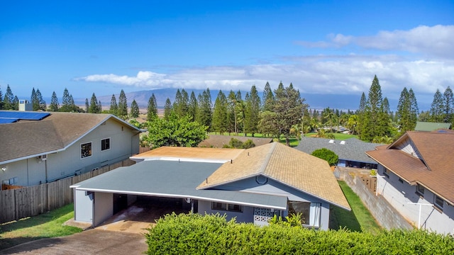 birds eye view of property featuring a mountain view