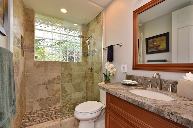 104 Woodrose Pl, Lahaina, HI 96761 - bathroom with a tile shower, recessed lighting, vanity, and toilet