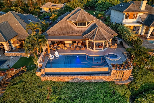 104 Woodrose Pl, Lahaina, HI 96761 - view of swimming pool featuring outdoor lounge area, a pool with connected hot tub, outdoor dining area, and a patio