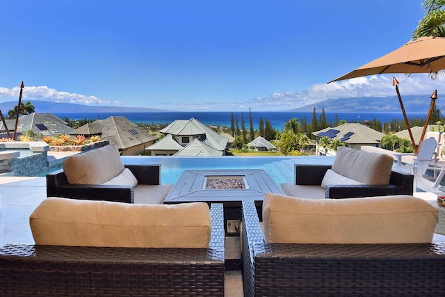 view of patio / terrace featuring outdoor lounge area and a mountain view