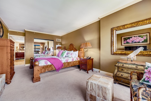 carpeted bedroom featuring ornamental molding