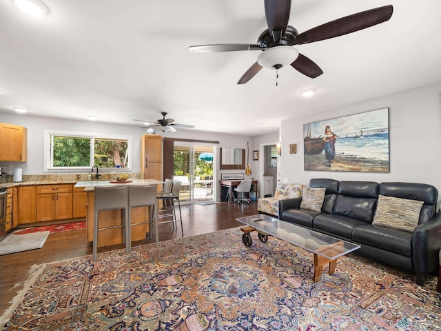 3100 Mapu Pl, Kihei, HI 96753 - living room featuring dark wood-type flooring and a ceiling fan
