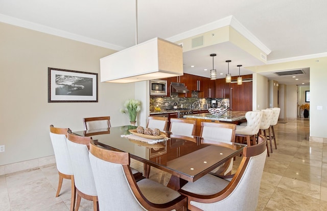 130 Kai Malina Pkwy Unit Nr202, Lahaina, HI 96761 - dining space with baseboards, crown molding, recessed lighting, and light tile patterned floors