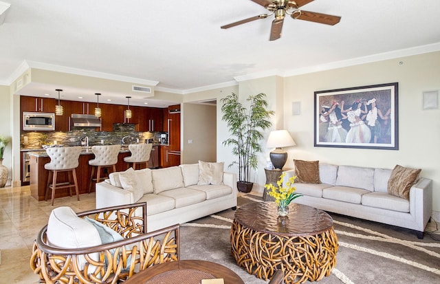 130 Kai Malina Pkwy Unit Nr202, Lahaina, HI 96761 - living room with ceiling fan and crown molding