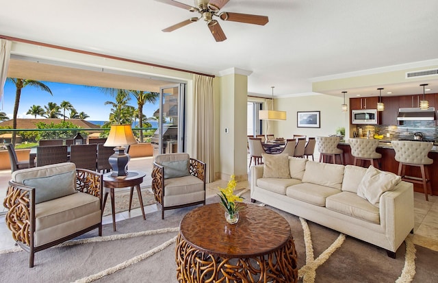 130 Kai Malina Pkwy Unit Nr202, Lahaina, HI 96761 - living area featuring a ceiling fan and ornamental molding