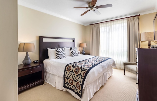 130 Kai Malina Pkwy Unit Nr202, Lahaina, HI 96761 - bedroom with light carpet, ornamental molding, and a ceiling fan