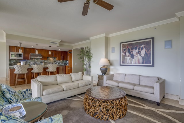 130 Kai Malina Pkwy Unit Nr202, Lahaina, HI 96761 - living area featuring crown molding and ceiling fan