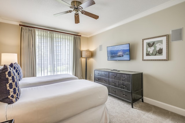 130 Kai Malina Pkwy Unit Nr202, Lahaina, HI 96761 - bedroom with light colored carpet, crown molding, baseboards, and ceiling fan