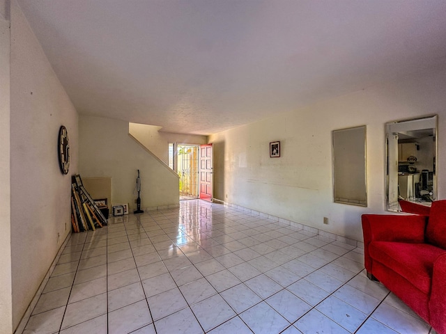 90 Auhana Rd Unit 202, Kihei, HI 96753 - unfurnished living room featuring light tile patterned floors
