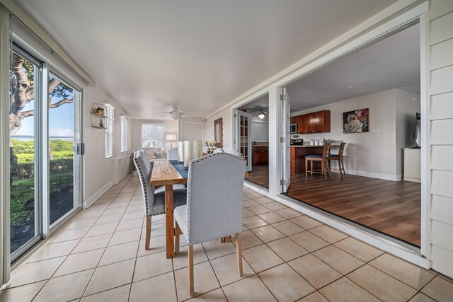 interior space with ceiling fan and light hardwood / wood-style flooring