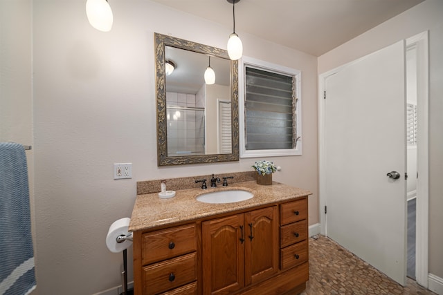 bathroom featuring tile flooring and vanity