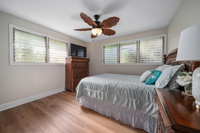 bedroom featuring ceiling fan and light wood-type flooring