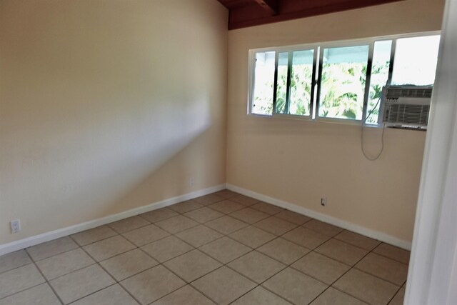 tiled spare room with cooling unit