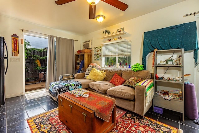 tiled living room with ceiling fan, a wall mounted AC, and a healthy amount of sunlight