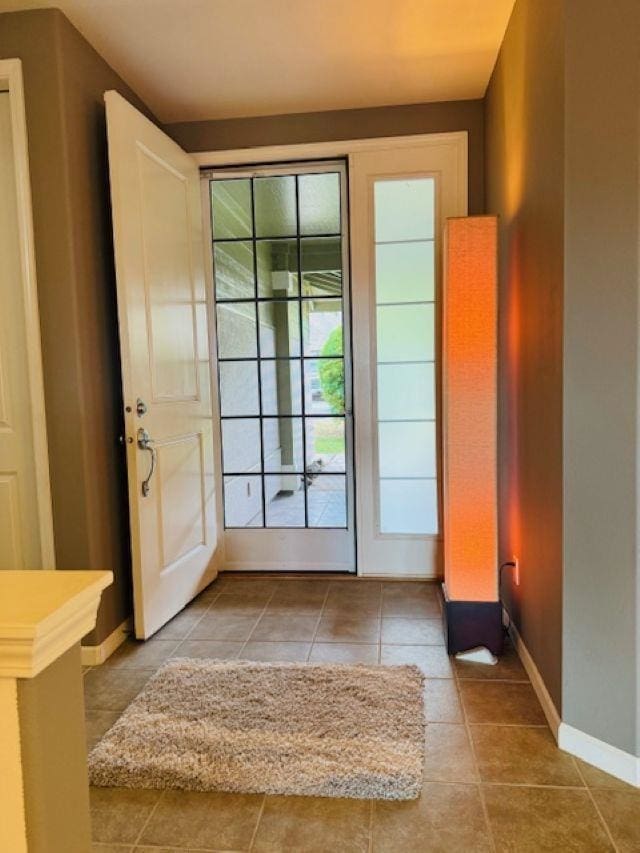 160 Kinohi Loa Loop, Wailuku, HI 96793 - doorway to outside with tile patterned floors and baseboards