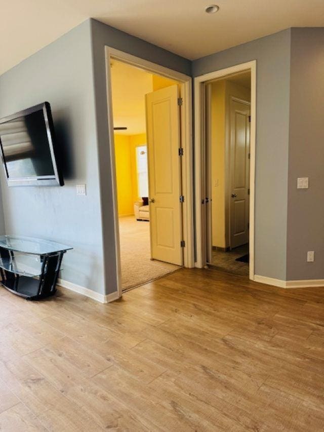160 Kinohi Loa Loop, Wailuku, HI 96793 - unfurnished living room featuring light wood finished floors and baseboards