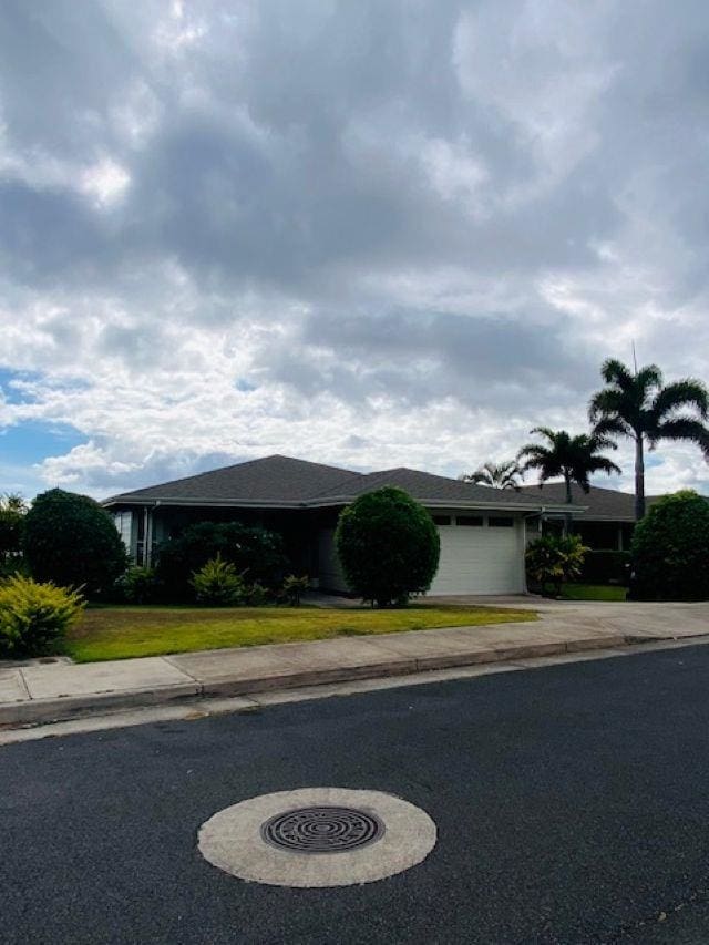 160 Kinohi Loa Loop, Wailuku, HI 96793 - ranch-style home with driveway, an attached garage, and a front yard