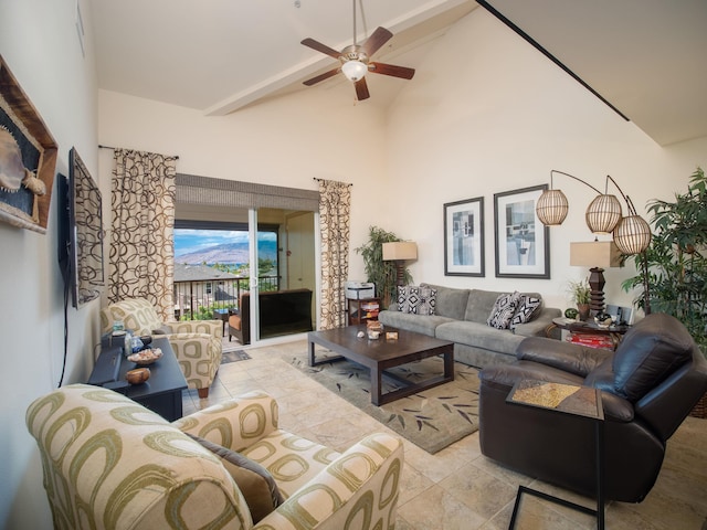 living room with beam ceiling, high vaulted ceiling, and ceiling fan