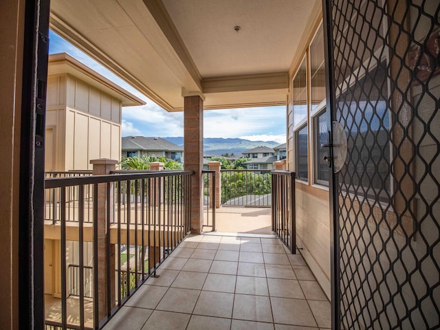 balcony featuring a mountain view