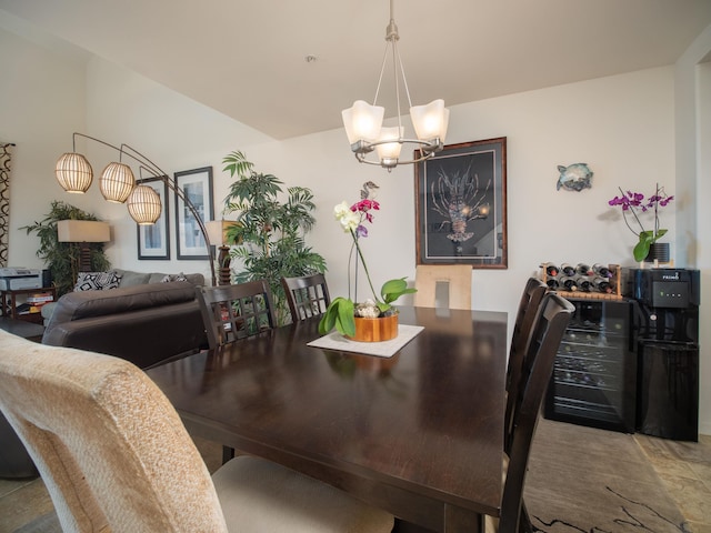 dining space with beverage cooler and a chandelier