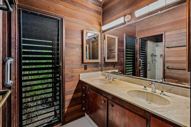 bathroom with vanity and wooden walls