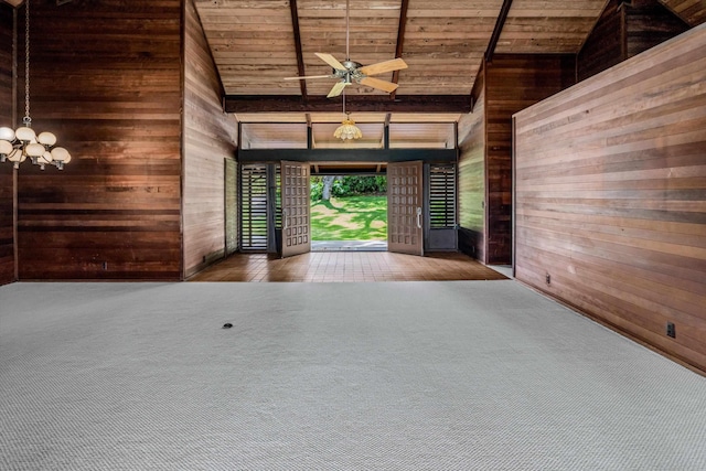 interior space featuring wood walls and wood ceiling